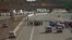 FILE - Traffic backs up on Interstate Highway 10 as authorities investigate the scene of a fatal accident in Phoenix, July 26, 2015. Road deaths rose 7.2 percent to 35,092 in 2015, the highest full-year increase since 1966.