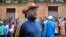 FILE - Burundi's President Pierre Nkurunziza speaks to the media after casting his vote in the constitutional referendum in Buye, north of Ngozi, in northern Burundi, May 17, 2018. 