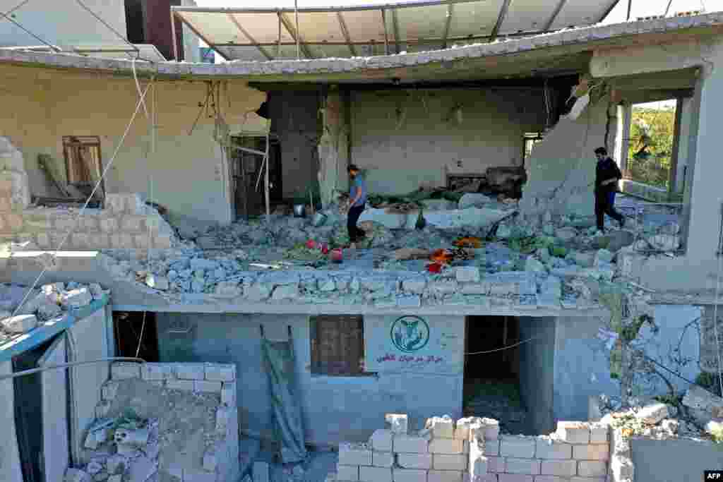 A building sheltering the only medical center in Syria&#39;s northwestern Jabal az-Zawiya region is seen after being struck by pre-dawn shelling.