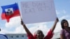 Foto Achiv: Wilda Brooks, ki abite West Palm Beach, Florid kenbe yon pankat ki di "Nou pa Manje Bet Moun" pandan yon manifestasyon nan No Miami, 22 Sept. 2024.