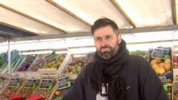 Organic food seller Gregory Framery is among a growing number of French rejecting intensive faming practices. (Lisa Bryant/VOA)