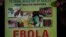 Nigeria health official display a leaflet explaining Ebola Virus Disease at the arrival hall of Murtala Muhammed International Airport in Lagos, Nigeria, Aug. 4, 2014.