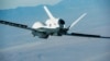 FILE - A U.S. Triton surveillance aircraft is seen during a test flight over Palmdale, California, in this handout photo released by the U.S. Navy May 22, 2013.