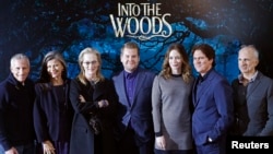 Cast members and crew pose during a media event for the film "Into the Woods," in London, Jan. 7, 2015.