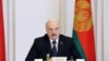 Belarus President Alexander Lukashenko speaks during a cabinet meeting in Minsk, Belarus, July 23, 2021. Belarusian authorities have ramped up raids and arrests of independent journalists and civil society activists in recent weeks.