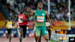 FILE — South Africa's Caster Semenya celebrates after winning the woman's 800m final at Carrara Stadium during the 2018 Commonwealth Games in Australia, April 13, 2018.