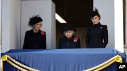 Britain's Queen Elizabeth II, Kate, Duchess of Cambridge, right, and Camilla, Duchess of Cornwall, attend the Remembrance Sunday ceremony at the Cenotaph in Whitehall in London, Nov. 10, 2019. 