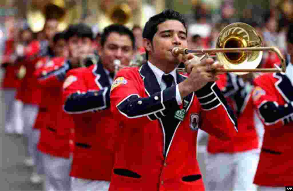 The Banda Musical Latina Pedro Molina of Guatemala performs during the Macy's Thanksgiving Day Parade in New York Thursday, Nov. 25, 2010. (AP Photo/Craig Ruttle)