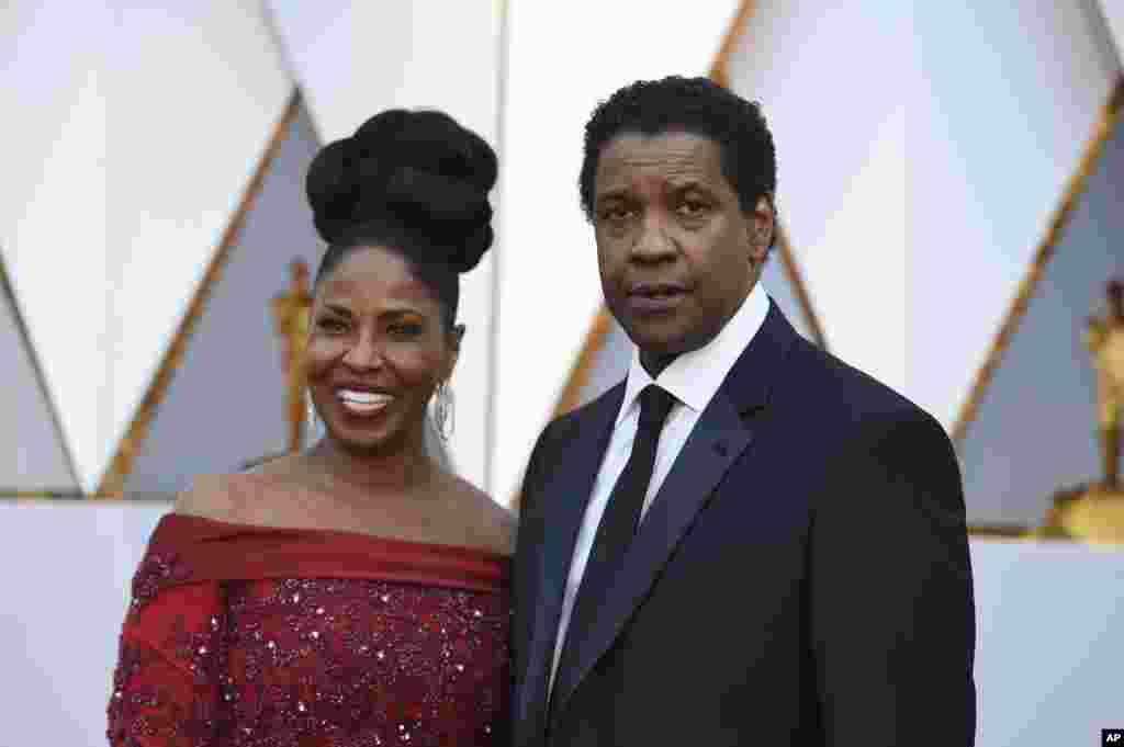 Aktor Denzel Washington dan istrinya Pauletta Washington&nbsp;tiba di acara Oscars (26/2) di Dolby Theatre di Los Angeles.