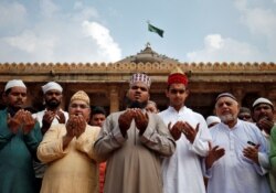 Muslims pray for peace ahead of verdict on a disputed religious site in Ayodhya, inside a mosque premises in Ahmedabad, India, Nov. 8, 2019.