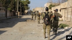 نیروهای کردی تحت حمایت ترکیه در شهرک راس العین