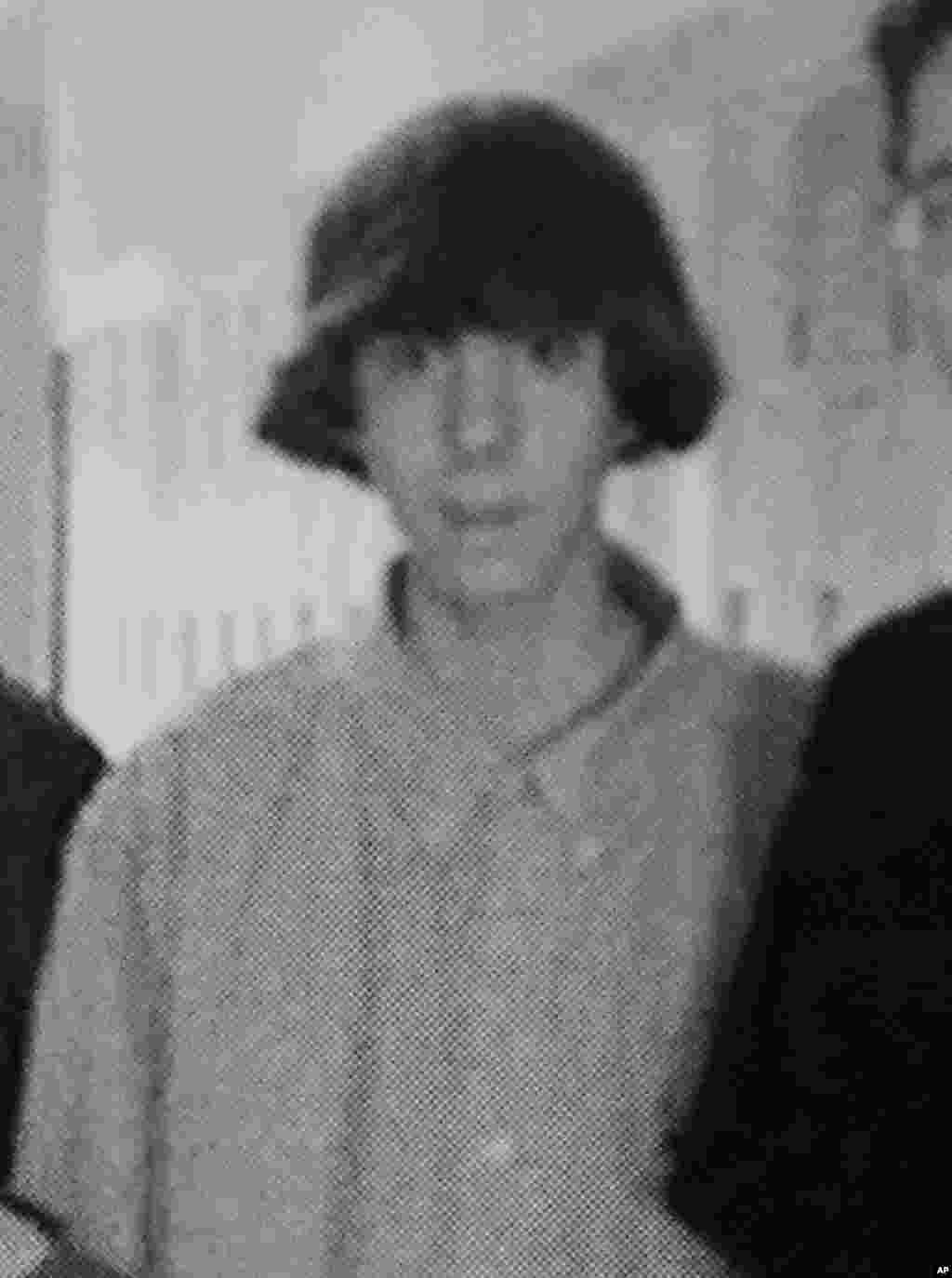 This undated photo shows Adam Lanza posing for a group photo of the technology club which appeared in the Newtown High School yearbook.