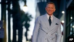 FILE - Daniel Craig appears during a ceremony honoring him with a star on the Hollywood Walk of Fame, Oct. 6, 2021, in Los Angeles.