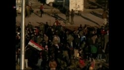 Buses Cross Ramouseh Bridge in Aleppo, Syria