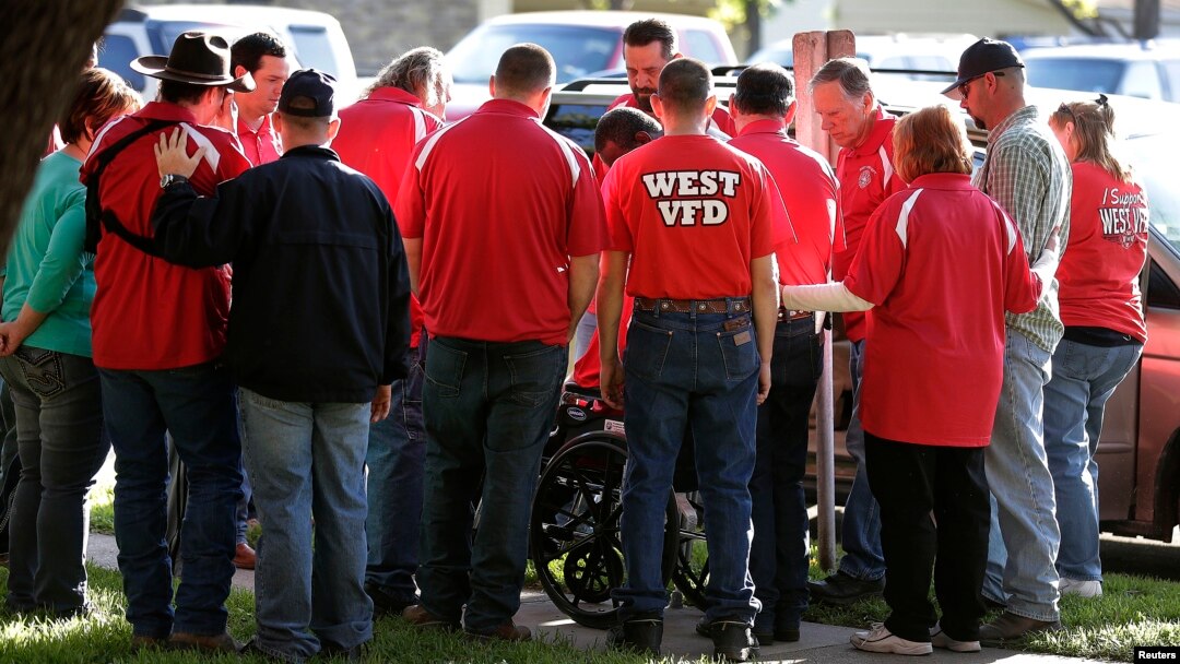 Members of the West Volunteer Fire Department gather after attending a service at St. Mary's Church of the Assumption, two days after an explosion at a fertilizer plant in West, Texas, April 19, 2013.