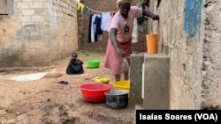 Água em casas de Malanje, Angola