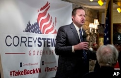 FILE - Republican candidate for governor of Virginia, Corey Stewart, speaks at a campaign kickoff rally in a restaurant in Occoquan, Va., Jan. 23, 2017. Stewart, a tough-talking former Donald Trump campaign chairman, says the president’s victory has freed candidates to "simply be yourself."