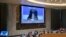 In this UN photo, Marcel Utembi, on screen, president of the National Episcopal Conference of the Congo, addresses the Security Council on the situation concerning the Democratic Republic of the Congo, Aug. 27, 2018.