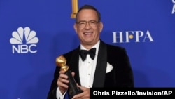 Tom Hanks, winner of the Cecil B. deMille Award, poses in the press room at the 77th annual Golden Globe Awards at the Beverly Hilton Hotel, Jan. 5, 2020, in Beverly Hills, California.