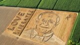 An aerial view of the image of Pope Francis by Italian artist Dario Gambarin is seen in a threshed wheat field in Castagnaro, near Verona, Italy. Gambarin used a tractor with a plow and a harrow to create the image on a 25,000 square-meter field.