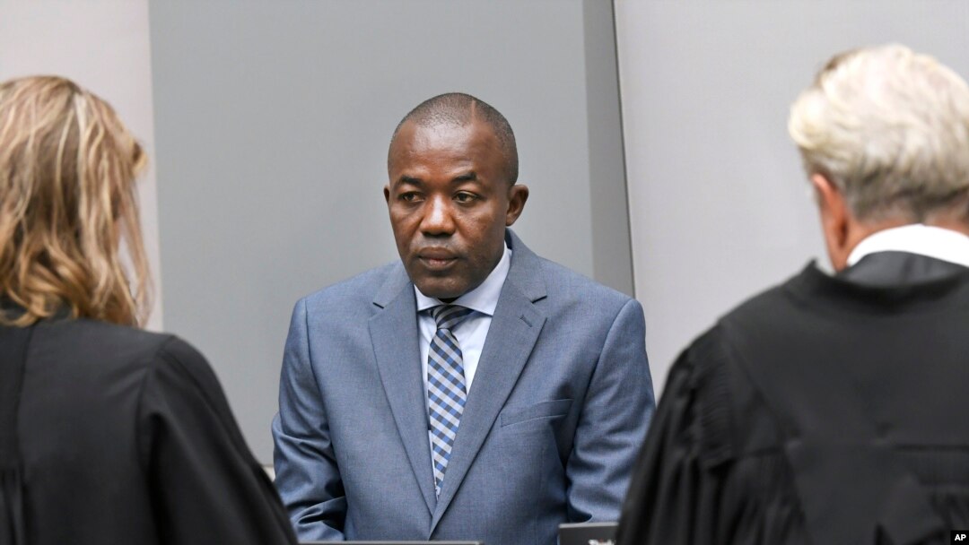 Alfred Yekatom, center, a Central African Republic lawmaker and militia leader who goes by the nickname Rambo, appears before the International Criminal Court, ICC, in The Hague, Netherlands, Nov. 23, 2018. 