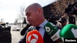 FILE - Former Spanish football federation chief Luis Rubiales leaves court in Madrid on Feb. 14, 2025. He was found guilty on Feb. 20 of sexual assault for kissing a player without her consent. 