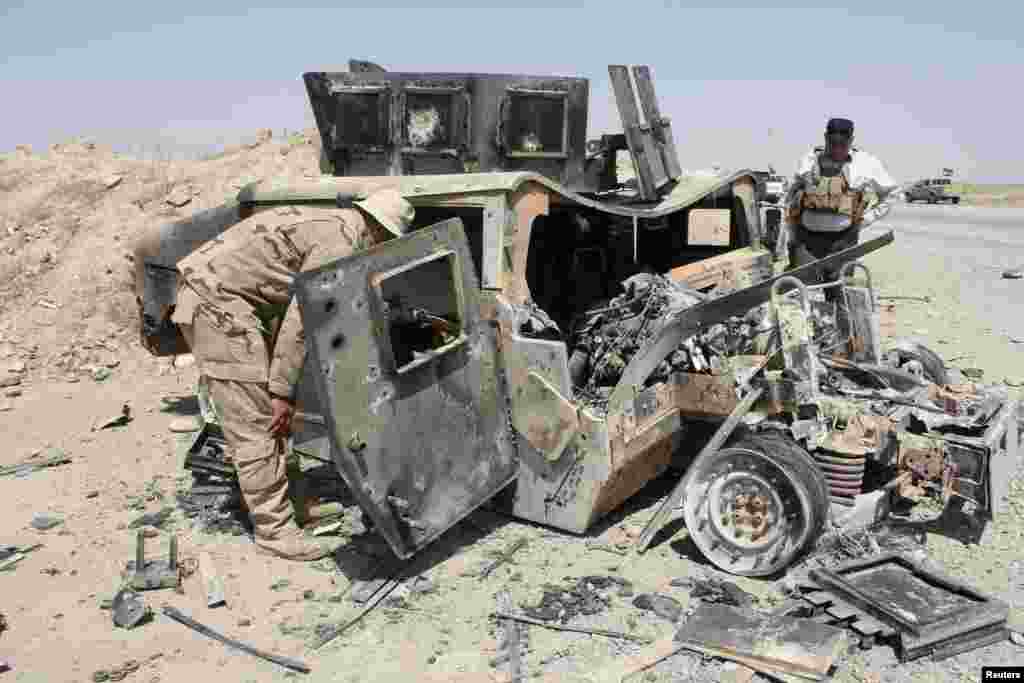بقایای یک خودرو نظامی شورشیان داعش پس از حمله ارتش عراق در سلیمان&zwnj;بیک &ndash; استان صلاح&zwnj;الدین، ۹ شهریور ۱۳۹۳