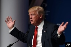 FILE - Then-Republican presidential candidate Donald Trump speaks at the Republican Jewish Coalition Presidential Forum in Washington, Dec. 3, 2015. In the campaign, Trump called for a "complete and total shutdown" on Muslims entering the United States. A campaign statement Dec. 7 said the proposal came in response to the level of hatred among "large segments of the Muslim population" toward Americans.