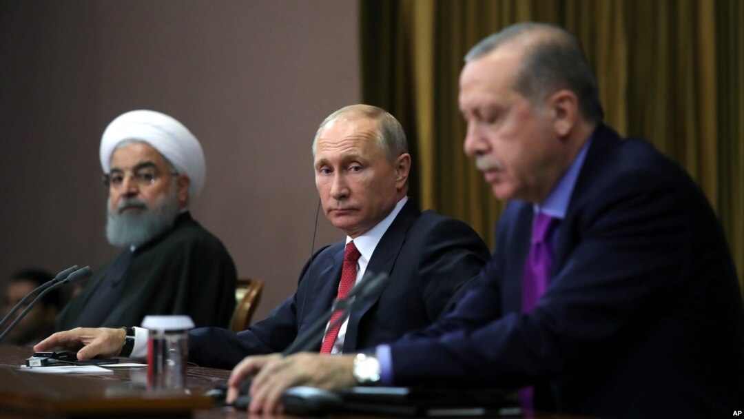 Erdogan, Putin i Rohani (s desna) na konferenciji za novinare u Sočiju, u novembru prošle godine (Mikhail Klimentyev/Pool Photo via AP)