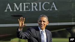 President Barack Obama walks across the South Lawn of the White House after arriving aboard the Marine One helicopter, April, 25, 2012.