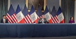 New York Gov. Kathy Hochul, right, New York Mayor Bill de Blasio, center, and NYC Health Commissioner Dr. Dave A. Chokshi, left, hold a virtual press conference, Dec. 2, 2021, in New York.