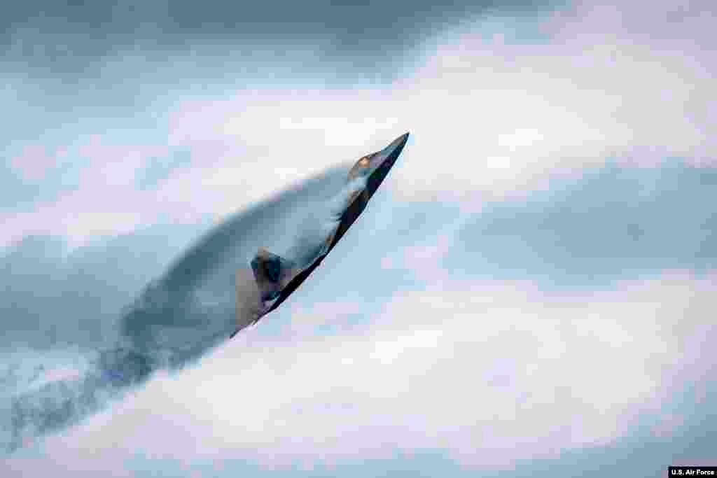 U.S. Air Force Maj. Paul "Loco" Lopez, F-22 Raptor Demonstration Team commander and pilot, performs during AirPower Over Hampton Roads JBLE Air and Space Expo at Joint Base Langley-Eustis, Virginia, in this May 18, 2018, image.