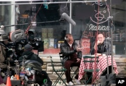 Actors Tony Sirico (Paulie Walnuts) and James Gandolfini (Tony Soprano), shoot a scene from the mafia drama, "The Sopranos," in Kearny, New Jersey, March 21, 2007.