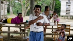 Antelmo Pereira leads a religious class in the indigenous Tikuna village of Santa Rosa, Brazil, Sept. 21, 2019. 