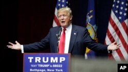 Republican presidential candidate Donald Trump speaks during a campaign rally April 6, 2016, in Bethpage, New York. According to a recent poll, Trump is viewed unfavorably by 7 out of 10 Americans, including half of Republican voters.