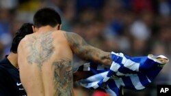 Dan wasan Portugal Juan Manuel dauke da zanen tattoo (Mun yi amfani da hoton ne don yin misali)