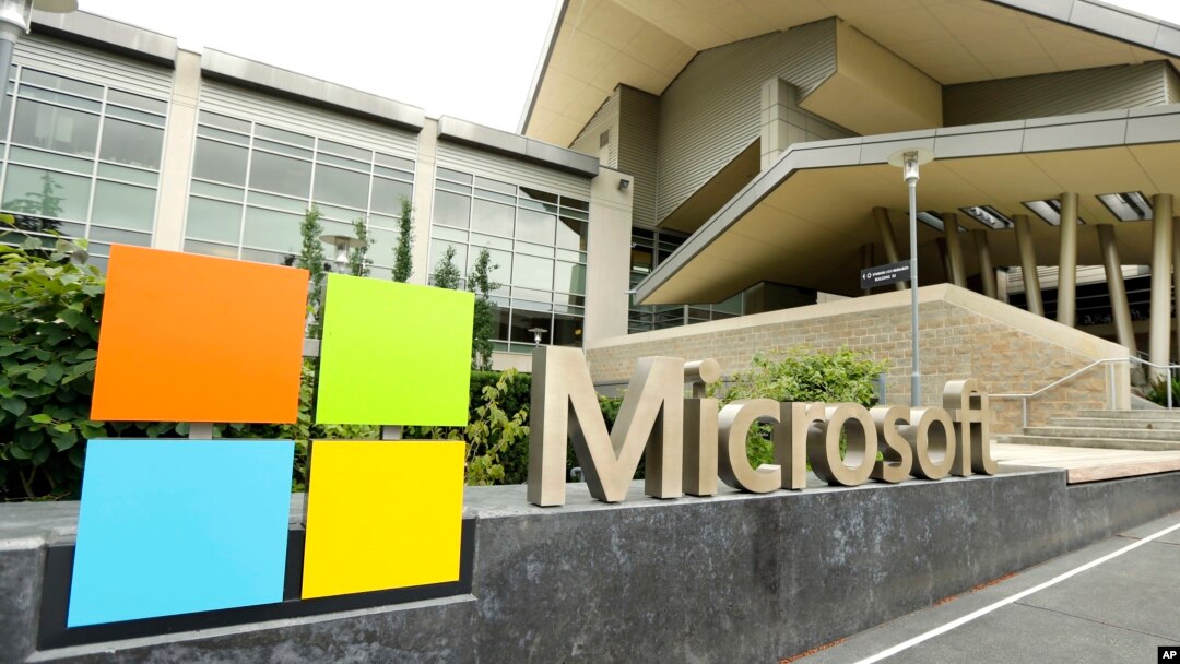 FILE - Microsoft Corp. signage is shown outside the Microsoft Visitor Center in Redmond, Wash.