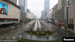 Street view after Wuhan government announced to ban non-essential vehicles in downtown area to contain coronavirus outbreak, on the second day of the Chinese Lunar New Year, in Wuhan, Hubei province, China January 26, 2020. cnsphoto via REUTERS…