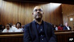 FILE -- Former Mozambican Finance Minister Manuel Chang, appears in court in Kempton Park, Johannesburg, South Africa, Jan. 8, 2019.