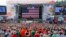 President Donald Trump waves to the crowd of scouts at the 2017 National Boy Scout Jamboree at the Summit in Glen Jean, West Virginia, July 24, 2017.
