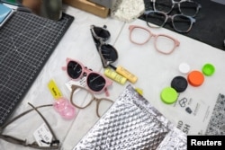 Sunglasses made from plastic waste are displayed at Trash Kitchen in Taipei, Taiwan August 19, 2024. (REUTERS/Ann Wang)