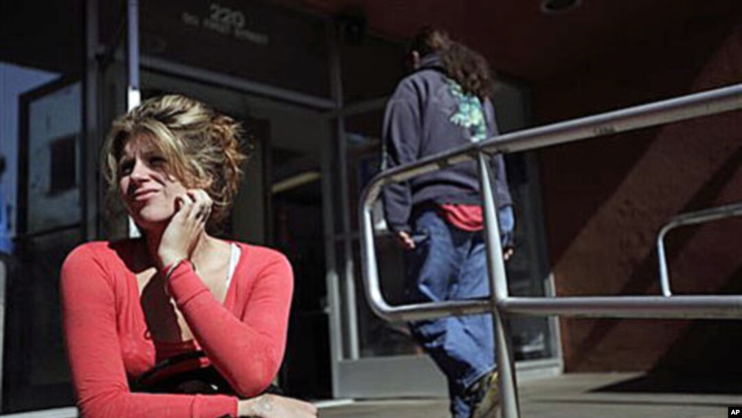 A woman who only gave her first name, Ally, said it was her first time applying for food stamps - the Supplemental Nutrition Assistance Program (SNAP) - at a city building in El Cajon, Calif., May 2010 (file photo)