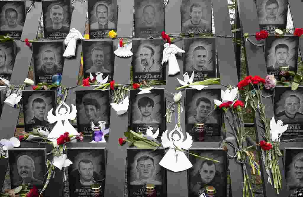 Mementos are seen at a memorial dedicated to people who died in clashes with security forces in late February 2014, at the Independence Square (Maidan) in Kyiv, Ukraine.