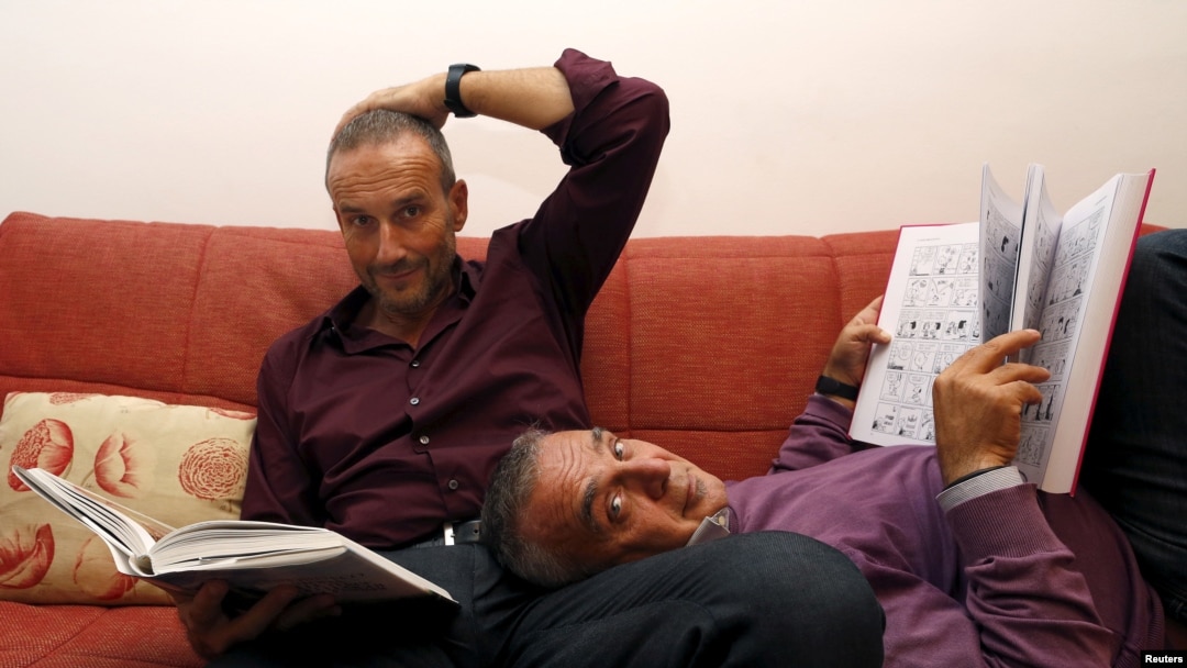 Because Italy remains the last major Western country to ban same-sex marriage, 30-year partners Gianni Finocchietti, left, and Rosario Murdica said their vows in Portugal. They're shown at home in Rome, Oct. 2, 2015.