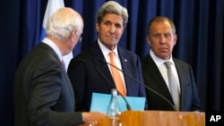 U.S. Secretary of State John Kerry, center, and Russian Foreign Minister Sergei Lavrov, right, look at U.N. special envoy Staffan de Mistura during a joint press conference following their meeting to discuss the crisis in Syria, in Geneva, Switzerland, Sept. 9, 2016.