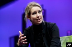 FILE - Elizabeth Holmes, founder and CEO of Theranos, speaks at the Fortune Global Forum in San Francisco, Nov. 2, 2015.