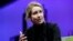 FILE - Elizabeth Holmes, founder and CEO of Theranos, speaks at the Fortune Global Forum in San Francisco, Nov. 2, 2015. Federal prosecutors said Friday they have indicted Holmes on criminal fraud charges for allegedly defrauding investors, doctors and patients.