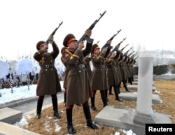 A gun salute is performed at the funeral of senior North Korean official Kim Yang Gon in Pyongyang in this photo released by North Korea's Korean Central News Agency (KCNA) on Dec. 31, 2015.