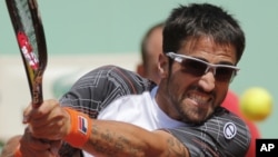 Petenis Serbia Janko Tipsarevic masih belum pulih dari cedera tumit dan diragukan bisa tampil di final Piala Davis (foto: dok). 