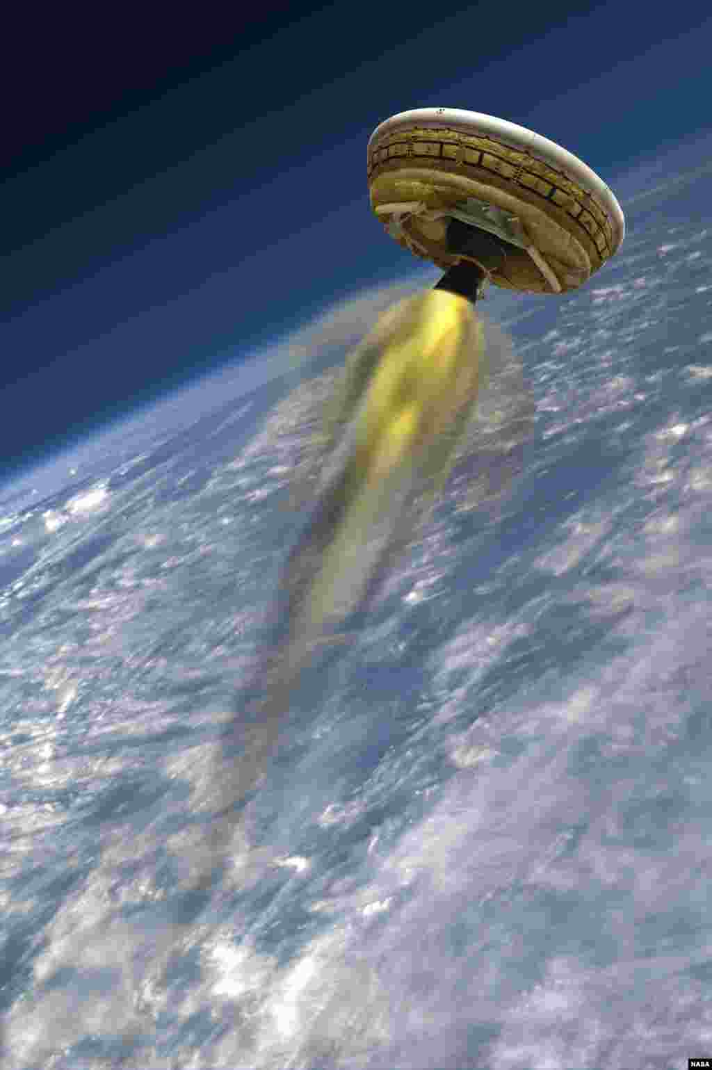 Konsep seorang seniman menunjukkan kendaraan uji coba milik NASA, Low-Density Supersonic Decelerator (LDSD), yang dirancang untuk menguji coba teknologi pendaratan untuk misi-misi Mars mendatang. Proyek LDSD akan menerbangkan kendaraan uji coba dengan tenaga roket, dan berbentuk seperti piring ke ruang angkasa dari Pacific Missile Range Facility milik Angkatan Laut AS di Kauai, Hawaii, pada bulan Juni.